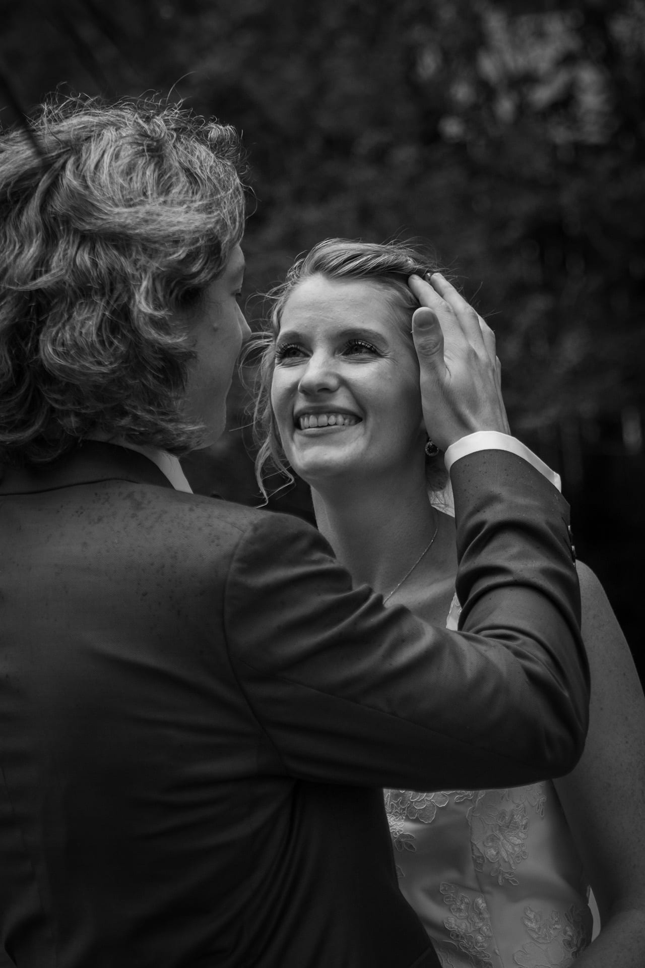 A quiet black and white moment between a newly married couple