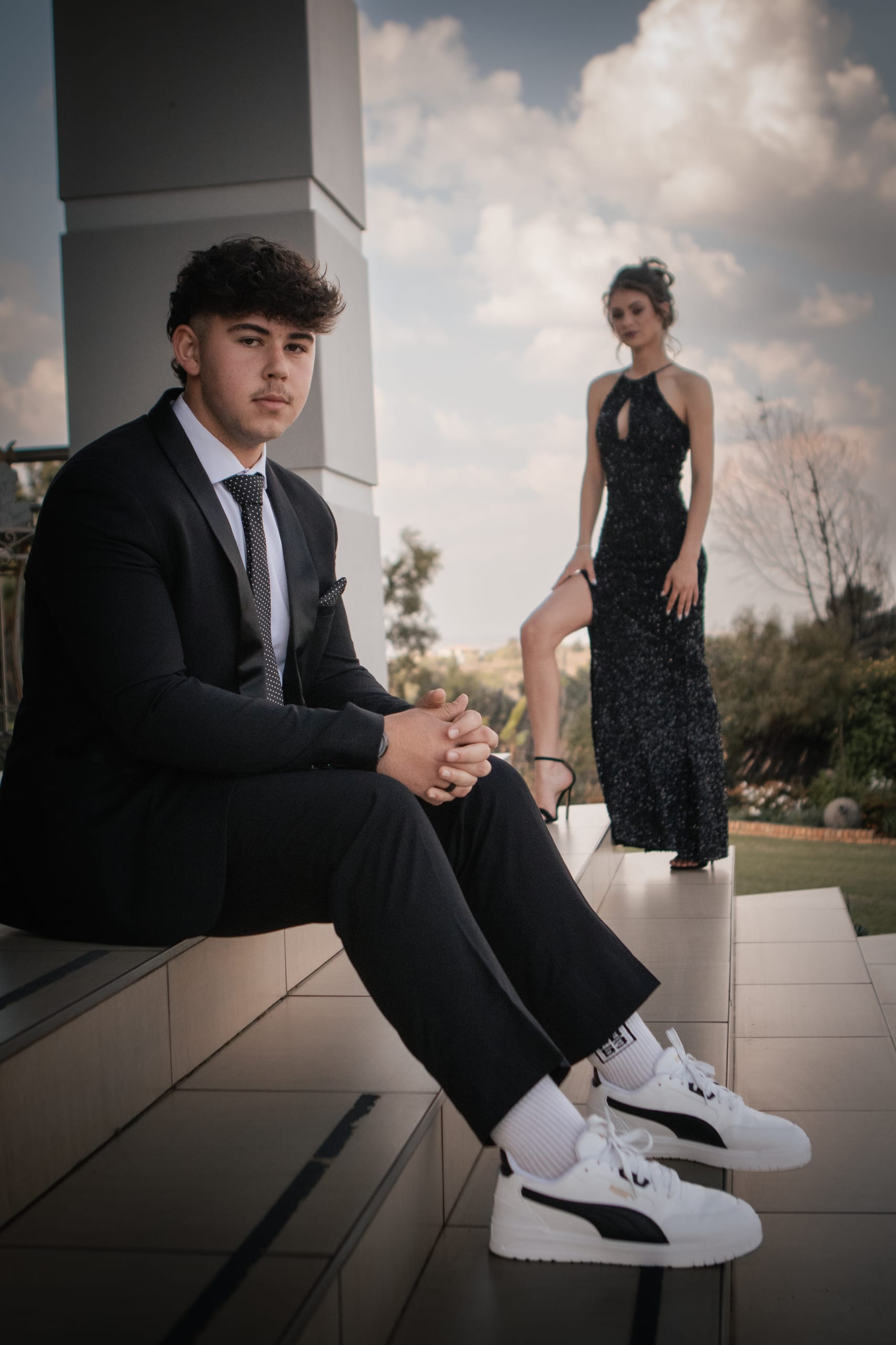 Matric farewell couple posed in an editorial portrait outside a venue
