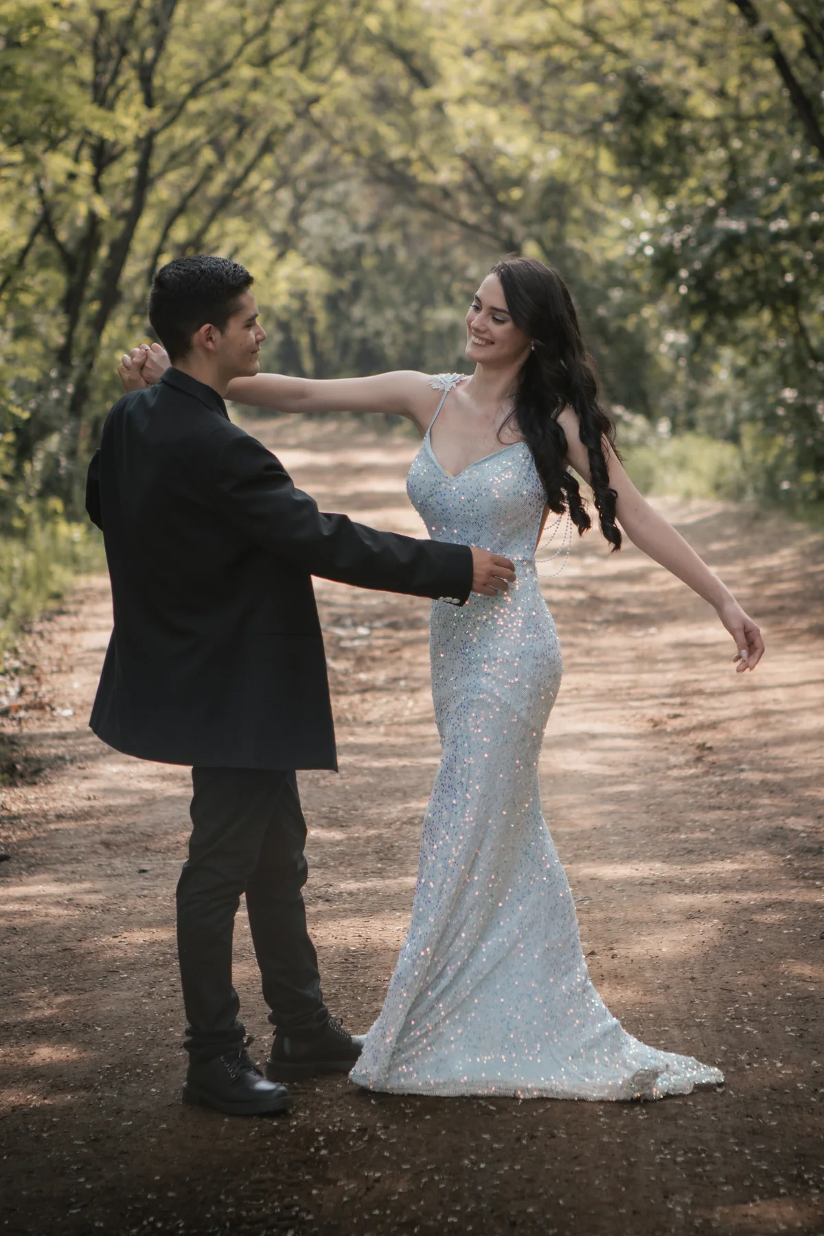 Toni and Chloe sharing a dance in the Rietvlei Zoo forest before their Matric Farewell.